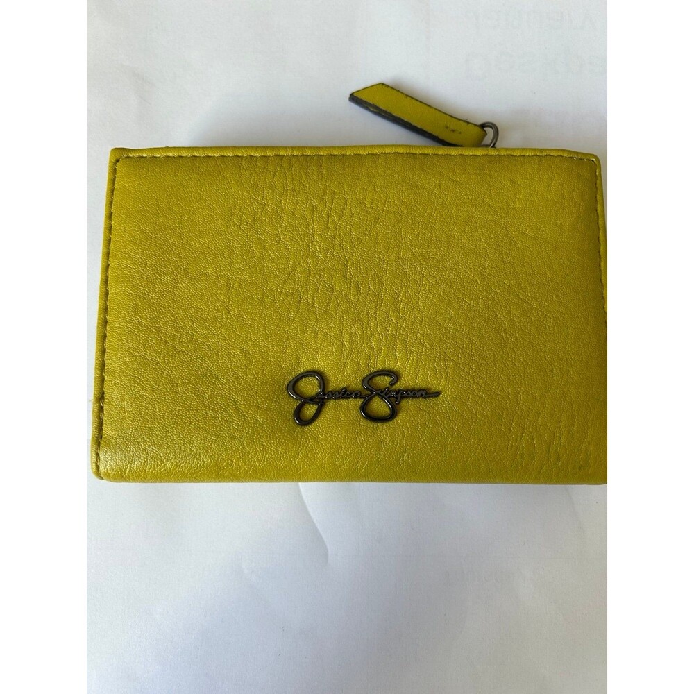 Jessica Simpson Fran SM wallet in a yellow or antique moss color.